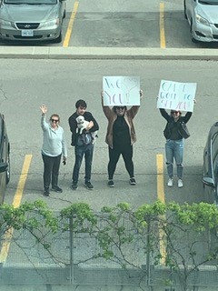 Darin's family supporting him from outside hospital