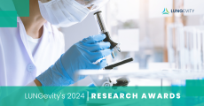 Researcher looking through microscope lungevity awards lung cancer 2024