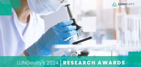 Researcher looking through microscope lungevity awards lung cancer 2024