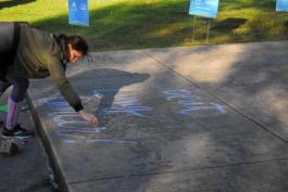 Volunteer chalks message of hope Volunteer chalks message of hope