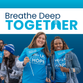 Smiling women at breathe deep together