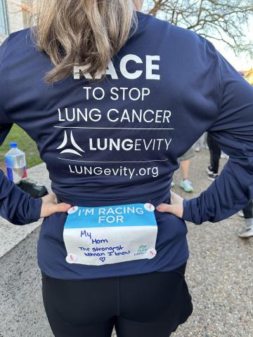 Backside of a Team LUNGevity shirt, saying "race to stop lung cancer"